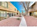 Neat courtyard with walkways and landscaping between buildings at 5945 Vegas Dr, Las Vegas, NV 89108