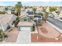Charming two-story home with desert landscaping and a two car garage and solar panels at 6112 Browning Way, Las Vegas, NV 89130