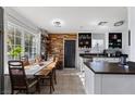 Kitchen features stainless steel appliances and a dining area at 6214 Gunderson Blvd, Las Vegas, NV 89103