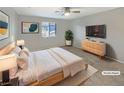 Bright main bedroom featuring a plush bed and ample space at 3206 Brynley Ave, Henderson, NV 89044