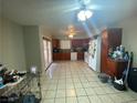 Eat-in kitchen with ample cabinet space and tile floors at 458 Crestway Rd, Henderson, NV 89015