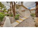 Condo exterior with walkway and stairs at 916 Rockview Dr # 201, Las Vegas, NV 89128