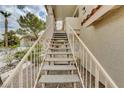 Exterior stairs leading to condo entrance at 916 Rockview Dr # 201, Las Vegas, NV 89128