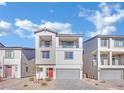 Two-story house with gray siding, red door, and gray garage door at 5566 Erindale Terrace Ave, Las Vegas, NV 89141