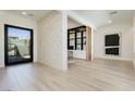 Bright entryway with stone wall and built-in shelving at 818 Meyer May St, Las Vegas, NV 89138