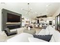 Open living area, fireplace, and kitchen view at 818 Meyer May St, Las Vegas, NV 89138