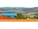 Stunning panoramic lake and mountain view from home at 943 Woodacre Dr, Boulder City, NV 89005