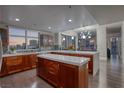 Open concept kitchen with island and stainless steel appliances at 150 Las Vegas Blvd # 907, Las Vegas, NV 89101