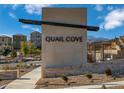 Modern community entrance sign for Quail Cove at 1537 Bat Hawk St, Las Vegas, NV 89144