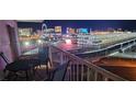 Balcony overlooking the Las Vegas Strip at night at 205 E Harmon Ave # 704, Las Vegas, NV 89169