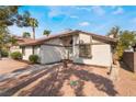 Front view of a single-story house with a walkway and landscaping at 3378 Del Marino St, Las Vegas, NV 89121