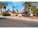 House exterior showcasing a well-maintained lawn and palm trees at 3378 Del Marino St, Las Vegas, NV 89121