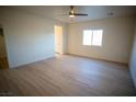 Bright bedroom with light flooring and ceiling fan at 521 Antelope Ave, Pahrump, NV 89060