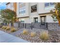 Stylish townhome entry with modern finishes and landscaping at 650 Sentinel Spire St, Las Vegas, NV 89138