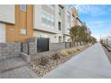 Townhome side view showcasing modern design and walkway at 650 Sentinel Spire St, Las Vegas, NV 89138