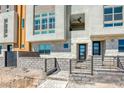 Private entrance to a townhome with modern stonework at 650 Sentinel Spire St, Las Vegas, NV 89138