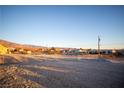 View of the property and surrounding desert landscape at 801 Fort Churchill Rd, Pahrump, NV 89060