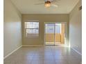 Spacious bedroom with tile flooring and balcony access at 8777 W Maule Ave # 2109, Las Vegas, NV 89148