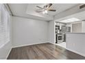 Bright dining area with wood-look floors and kitchen views at 1900 High Valley Ct # 104, Las Vegas, NV 89128