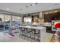 Spacious kitchen featuring stainless steel appliances and an island at 232 Errogie St, Henderson, NV 89012