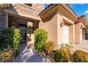 Front entry with walkway, landscaping, and garage access at 2837 Josephine Dr, Henderson, NV 89044