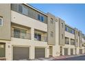 Modern townhome community featuring attached garages and balconies at 3772 Brilliant Sunset St, Las Vegas, NV 89129