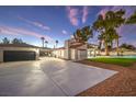 Spacious backyard with large pool and attached garage at 5750 Edna Ave, Las Vegas, NV 89146