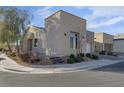 Stylish home exterior showing the corner lot with tasteful landscaping at 7017 Solana Ridge Dr, North Las Vegas, NV 89084