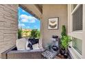 Cozy patio with seating area, water fountain, and landscaping at 724 Last Dance Pl, Henderson, NV 89011