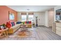 Bright and airy living room with L-shaped sofa and large windows at , North Las Vegas, NV 89084