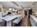 Open concept kitchen with large marble island and breakfast bar at 3111 Bel Air Dr # 20H, Las Vegas, NV 89109