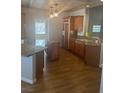 Spacious kitchen with wood cabinets and granite countertops at 4345 Al Carrison St, Las Vegas, NV 89129