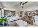 Open concept living area with comfortable seating and built-in shelving at 4884 E Cactus Canyon Dr, Pahrump, NV 89061