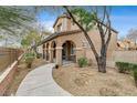 Two-story house with walkway leading to the entrance at 10079 S Riley St, Las Vegas, NV 89178