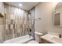 Updated bathroom with a bathtub and modern vanity at 104 Temple Dr, Las Vegas, NV 89107