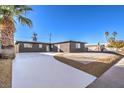 Updated single story home with new landscaping and driveway at 104 Temple Dr, Las Vegas, NV 89107