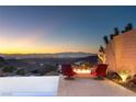 Fire pit and seating area with panoramic city views at 49 Vista Outlook St, Henderson, NV 89011