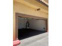 A roomy garage provides secure parking and additional storage at 5915 Nuevo Leon St # 7, North Las Vegas, NV 89031