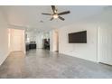 Spacious living room with tile flooring and ceiling fan at 7933 Grey Teal St, North Las Vegas, NV 89084