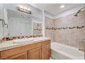 Bathroom with a soaking tub and tile surround at 8255 S Las Vegas Bl Blvd # 718, Las Vegas, NV 89123