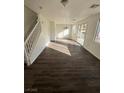 Bright dining area featuring dark laminate floors and lots of natural light at 8553 Last Point Ave, Las Vegas, NV 89129