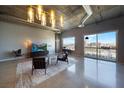 Spacious living room with city views and modern furniture at 900 Las Vegas Blvd # 901, Las Vegas, NV 89101