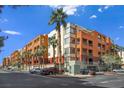 Exterior shot of the community building showcasing its contemporary architecture and manicured surroundings at 43 E Agate Ave # 403, Las Vegas, NV 89123
