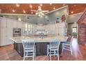 Large kitchen featuring granite countertops and custom cabinetry at 5110 N Valadez St, Las Vegas, NV 89149