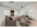 Virtually staged living room with fireplace and high ceilings at 5884 Del Rey Ave, Las Vegas, NV 89146