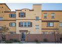 Rear view of townhouse showing private backyard and block wall at 1525 Spiced Wine Ave # 23103, Henderson, NV 89074