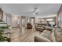 Spacious living room featuring hardwood floors and neutral colors at 1664 Hartley Ave, Henderson, NV 89052