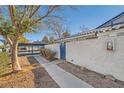 Side view of a house with walkway, gate, and carport at 2137 Willowbury Dr # B, Las Vegas, NV 89108