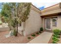 Inviting front entry with a security door and well-maintained landscaping at 2452 Sunup Dr, Las Vegas, NV 89134