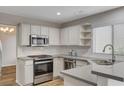 Modern kitchen with stainless steel appliances and an island at 2452 Sunup Dr, Las Vegas, NV 89134